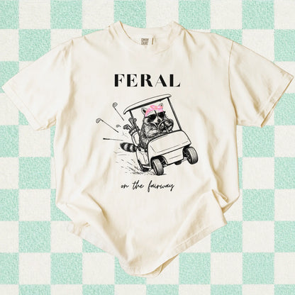Funny Golf Girl Shirt - Feral Raccoon Driving Golf Cart Graphic Tee - Funny Golf Shirt for Women - Comfort Colors T-Shirt