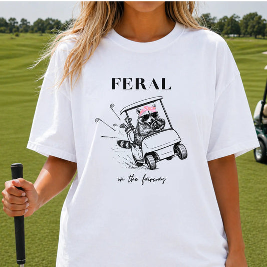 Funny Golf Girl Shirt - Feral Raccoon Driving Golf Cart Graphic Tee - Funny Golf Shirt for Women - Comfort Colors T-Shirt